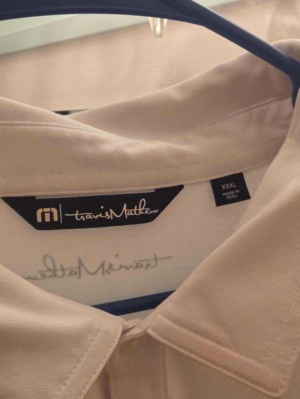Travis Mathew Men's Polo Shirt In White With Blue Stitching Clean